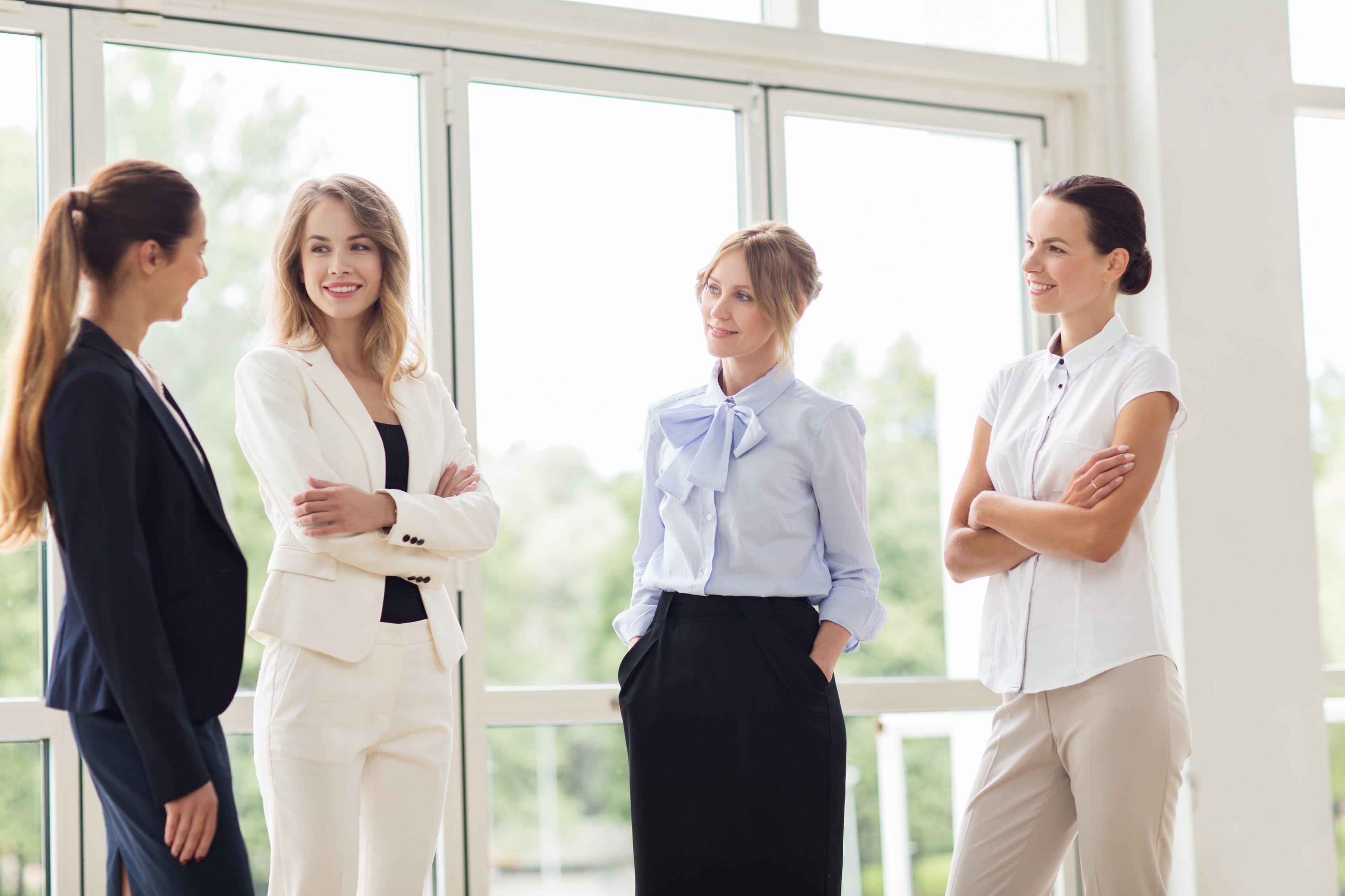 Business Women Meeting at Office and Talking